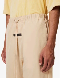ESSENTIALS Brand-patch Straight-leg Relaxed-fit Cotton-blend Trousers -KOOPES Clothing Shop R04126205 SAND ALT04