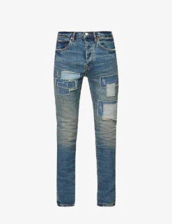 Repair Tapered-leg Low-rise Stretch-denim Jeans